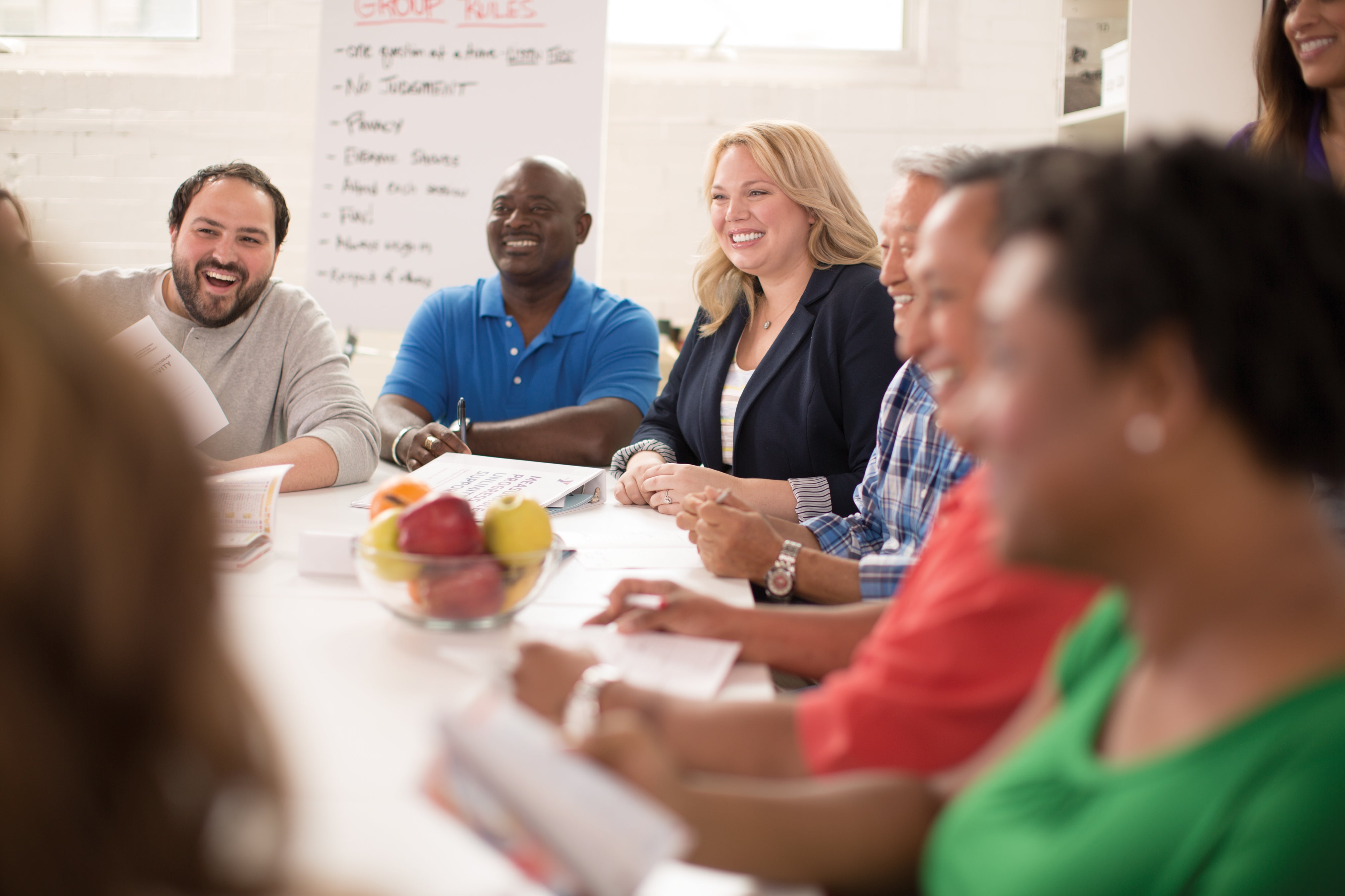Group of adults at a meeting about nutrition