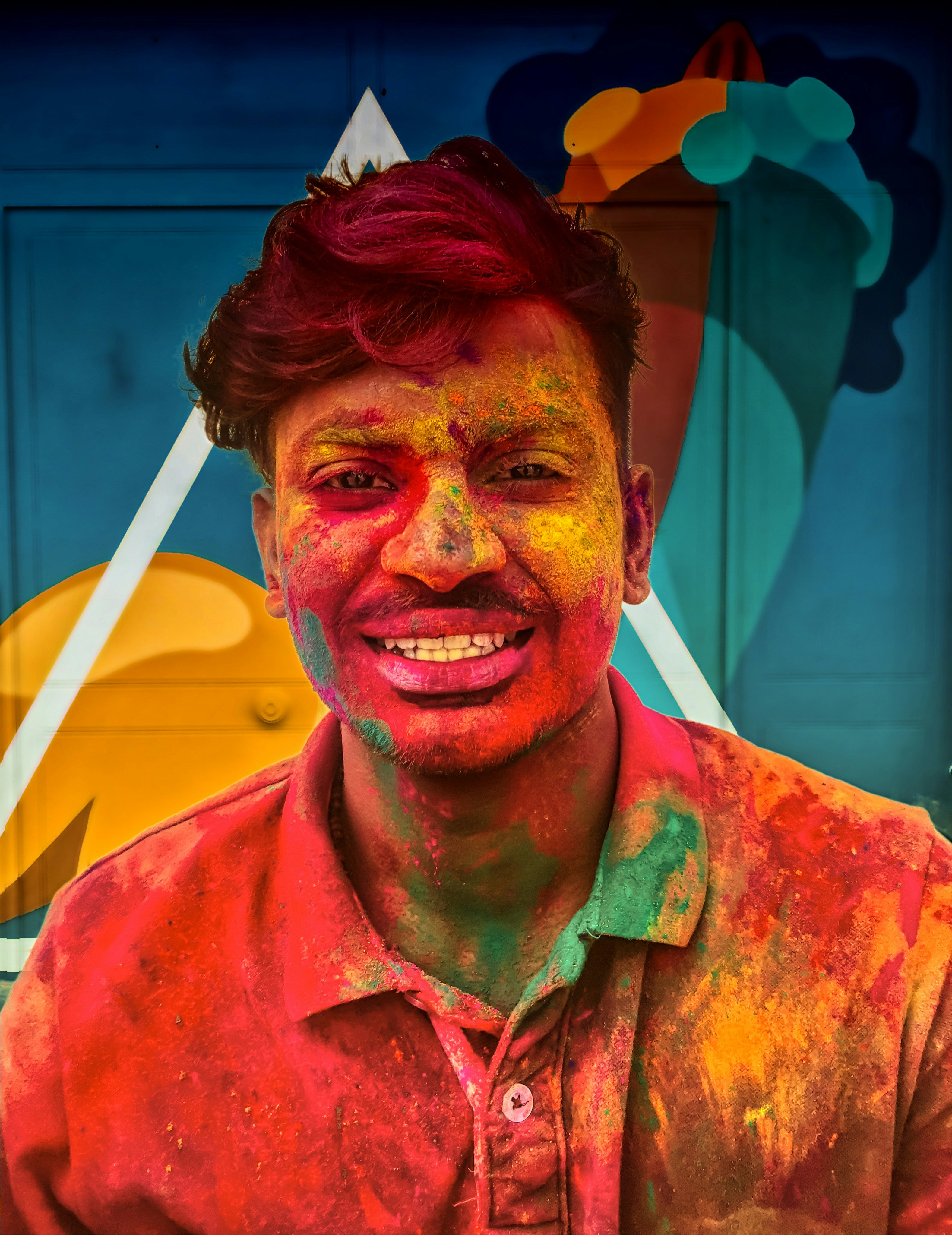 Holi colors on man's face