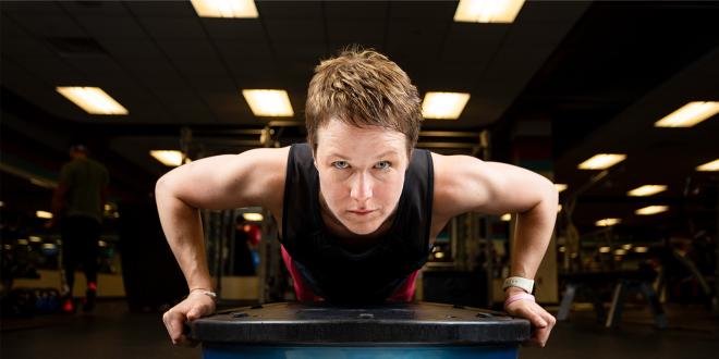 Fit woman on a bosu ball