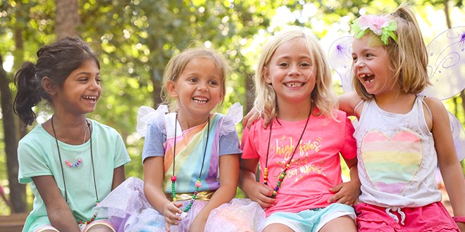 four young girls at day camp