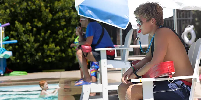 2 YMCA lifeguards on deck