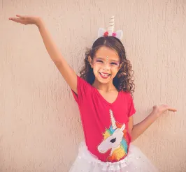 girl in unicorn outfit with tutu