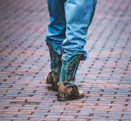 cowboys boots walking away