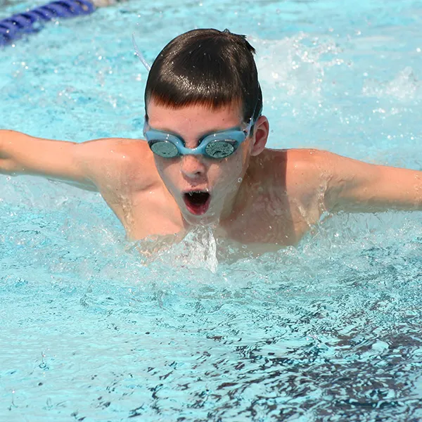 Young boy swimming