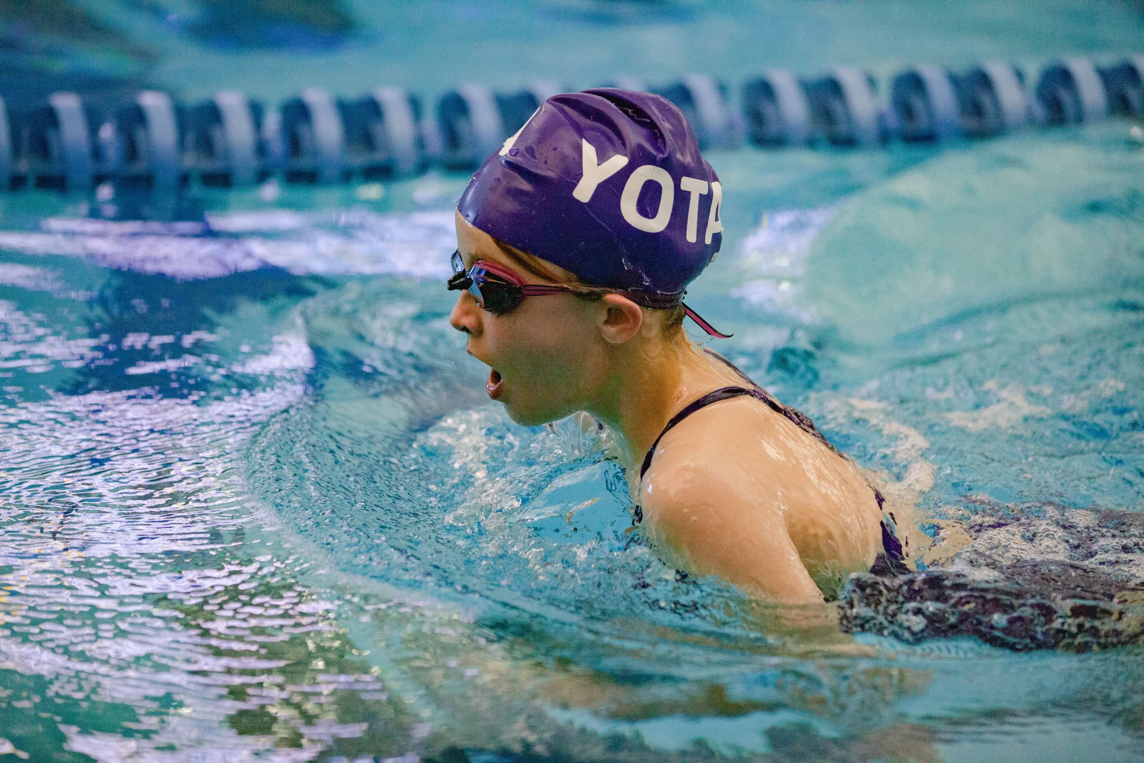 Swim Team member in the pool