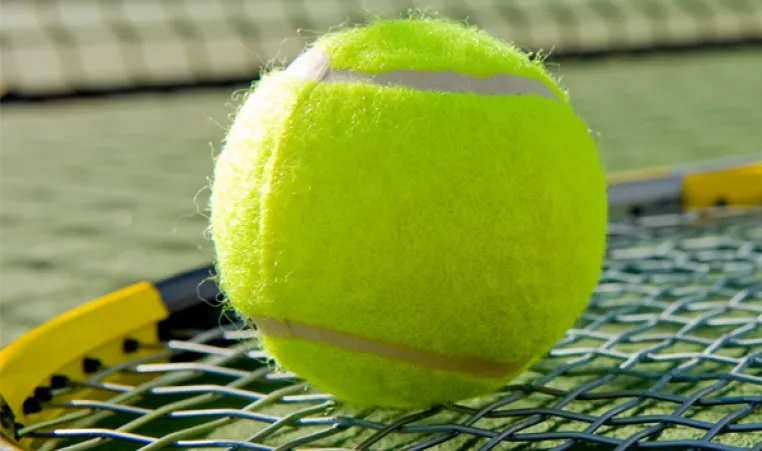 tennis ball and racquet