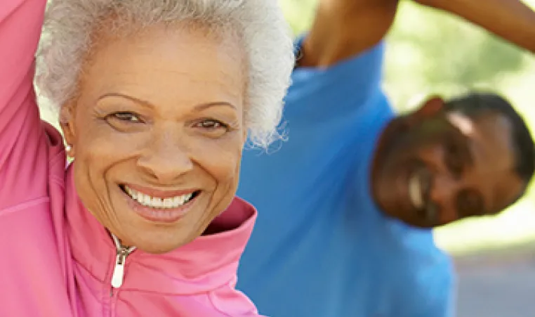 Two adults participating in Tai Chi