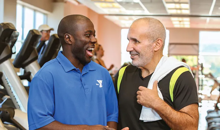YMCA staff with member