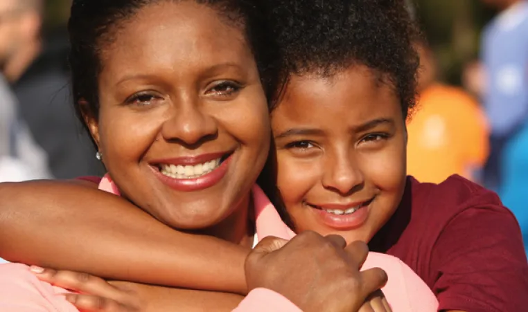 Mom and daughter hugging