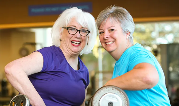 Older women lifting weights