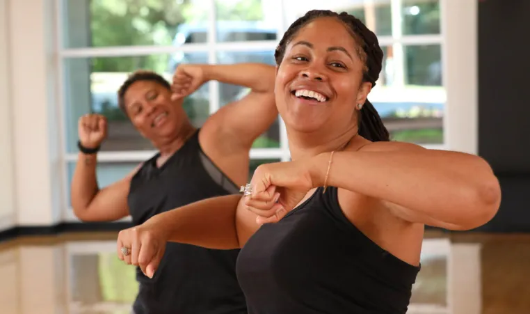 two women in a YMCA zumba class