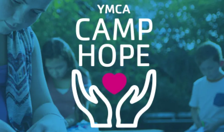 kids doing art project with YMCA Camp Hope