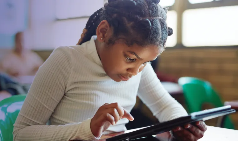Girl in class with ipad
