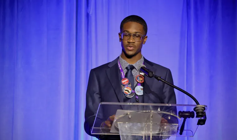 Teenager at a podium