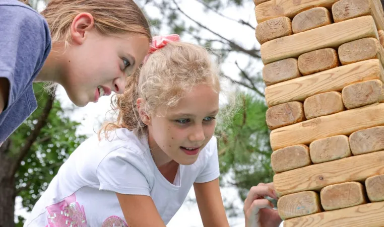 Kids playing outdoor Jenga