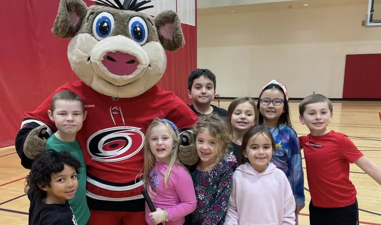 Stormy with YMCA kids in Canes Street Clinic