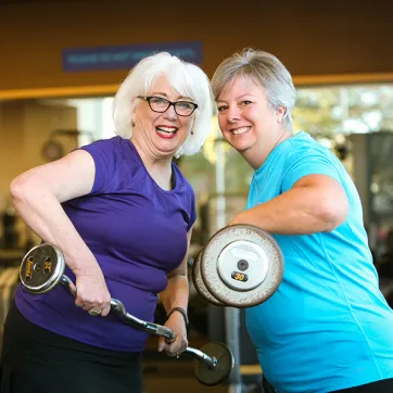 Older women lifting weights