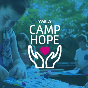 kids doing art project with YMCA Camp Hope