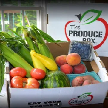 a produce box filled with vegetables