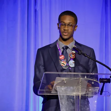 Teenager at a podium