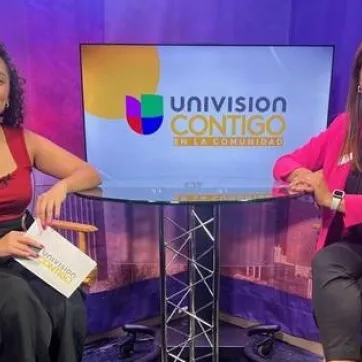 "Univision Contigo" Host Mayra Rodas interviews Taylor Family YMCA Community Case Manager Coreen Villalobos.