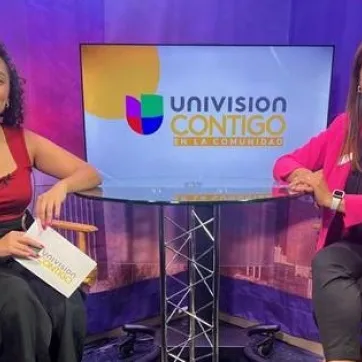 "Univision Contigo" Host Mayra Rodas interviews Taylor Family YMCA Community Case Manager Coreen Villalobos.