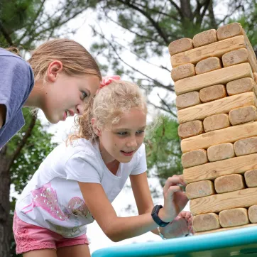 Kids playing outdoor Jenga
