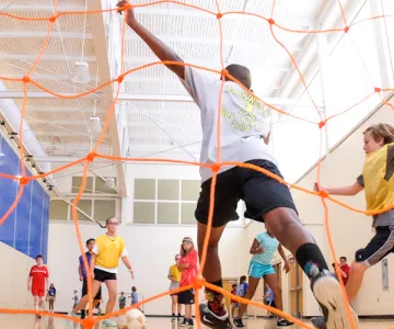 Kids playing soccer at YMCA sports camp