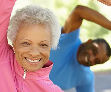 Two adults participating in Tai Chi