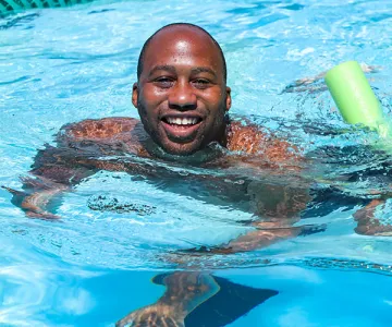 Adult man swimming