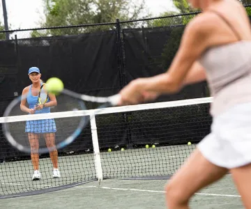 Women playing tennis