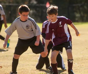 Boys playing soccer